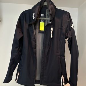 Helly Hansen women’s crew sailing jacket. Navy Blue- New With Tags NWT